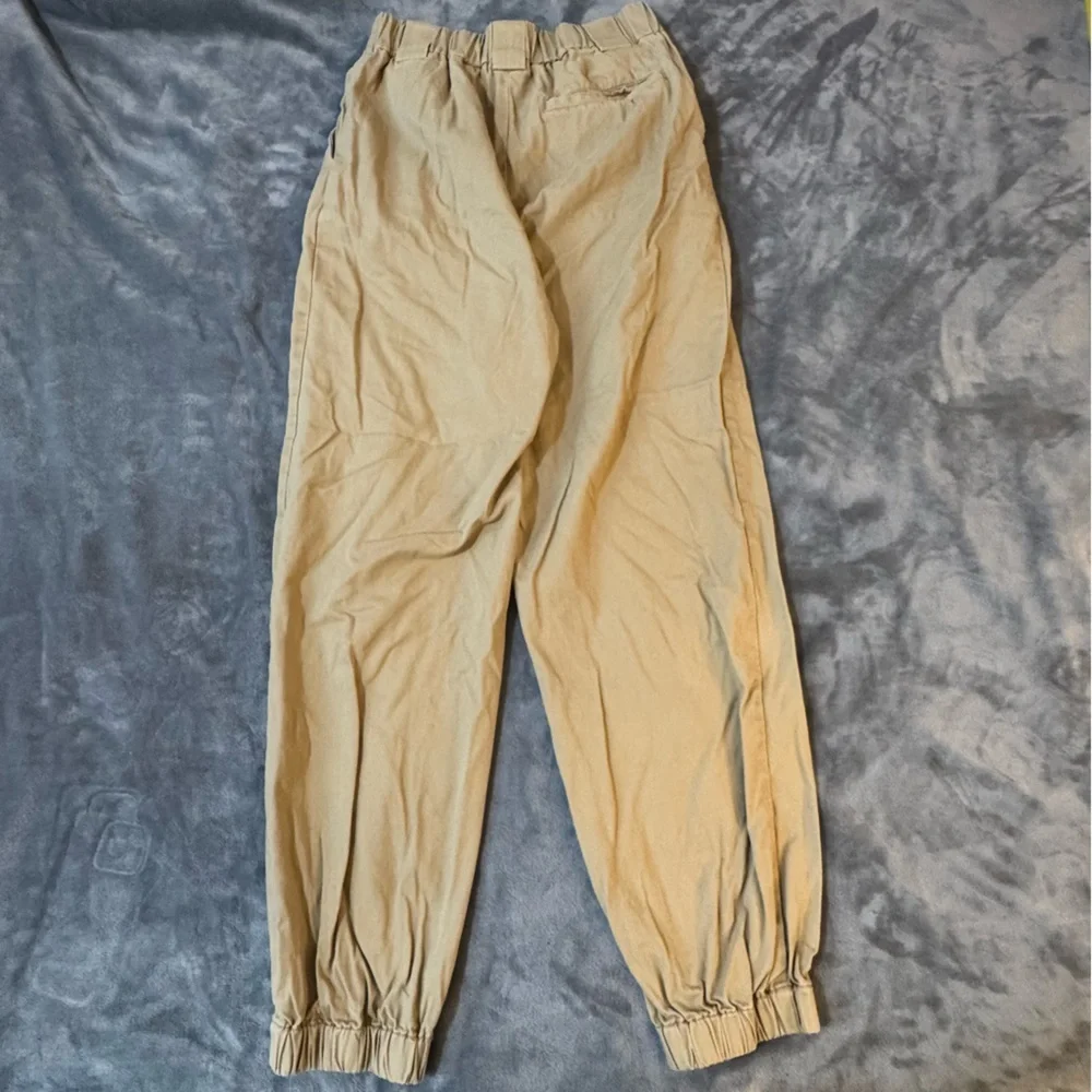 TNA Tan Track Pants for Women

#1244 - Picture 11 of 12